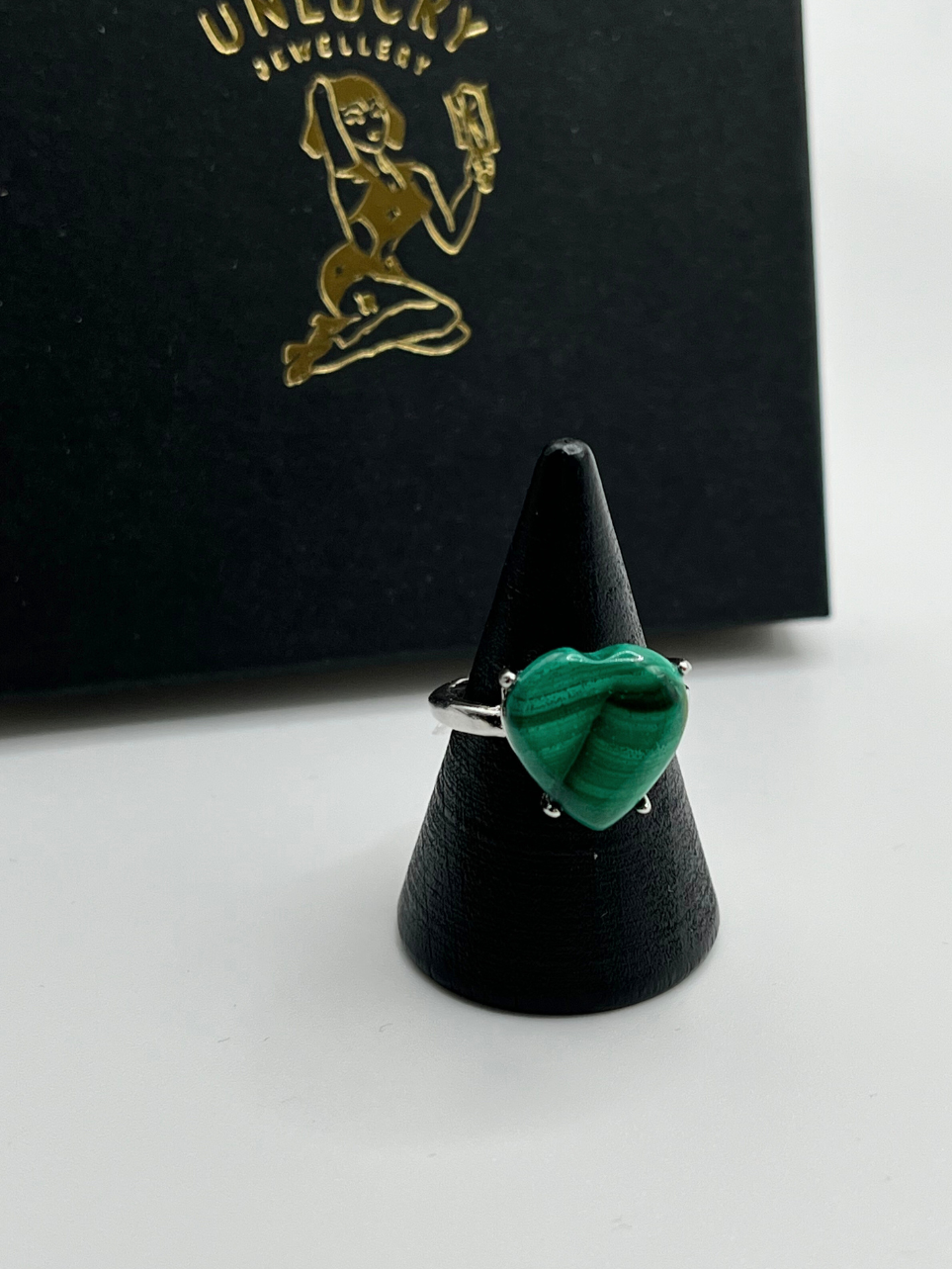 Malachite Gemstone Ring on stand