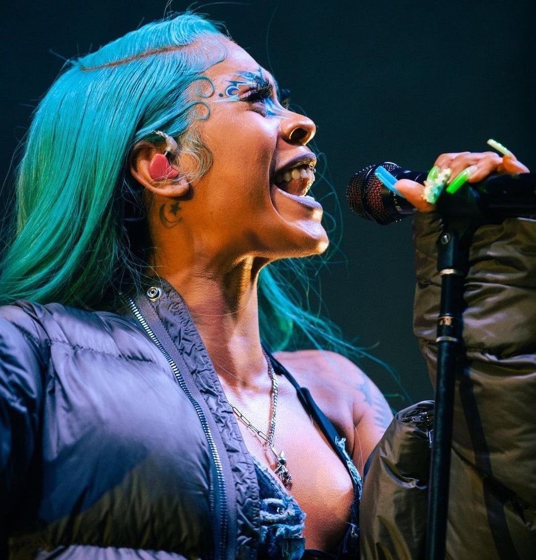 Rico Nasty wears bunny necklace